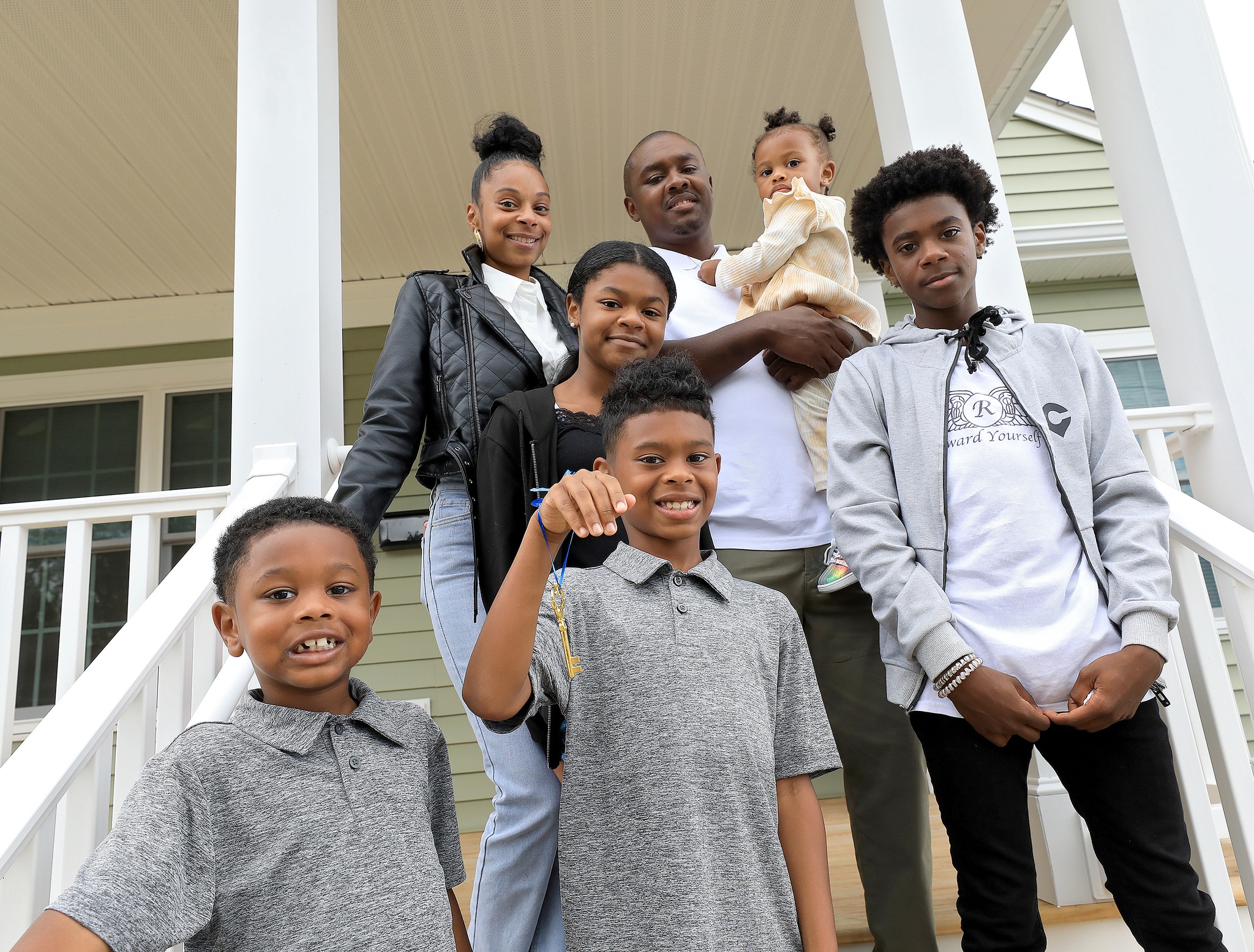 Scott Family of Seven with their New Home