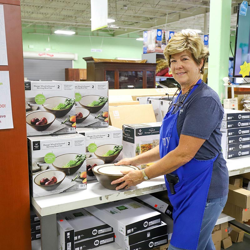 Woman serving bowls on sale at Newport News Restore