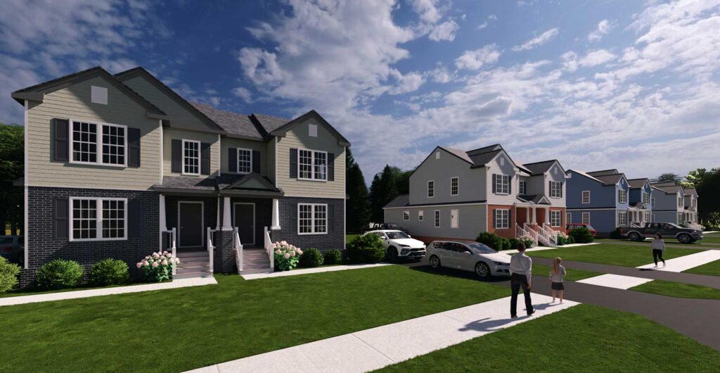 People walk on a sidewalk in a suburban neighborhood with modern duplex homes and parked cars under a blue sky.