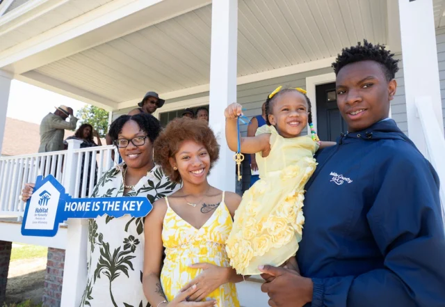 Just in time for summer cookouts and long evenings spent playing outside until dusk, Habitat for Humanity Peninsula and Greater Williamsburg is proud to welcome Kendra and her family into their newly built home in Hampton.

For Kendra—a Hampton native, mother of three, school nutrition professional and active church member—this home represents far more than just four walls and a roof. It’s the fulfillment of a long-held dream built on determination, faith and a supportive community that believed in her every step of the way.

That dream was made possible thanks to the generosity of First Baptist Church of Hampton, the official building partner for this project.

Kendra qualified for the home through Habitat’s first-time Homebuyer Program, a rigorous process that ensures families are financially ready and willing to contribute sweat equity—helping build their own home and others alongside Habitat volunteers.

“This home is more than bricks and mortar,” said Shauntrice Williams, CEO of Habitat for Humanity Peninsula and Greater Williamsburg. “It’s built with love, by hands that care, and by partners who believe that everyone deserves a place to thrive.”

For Kendra, who also is expecting her first grandchild and serves through her church’s Firehouse Ministry, this home is a foundation for new memories, stability and possibility.

It’s a fresh start—and a forever home.

Join us in celebrating this milestone.

Welcome home, Kendra and family!